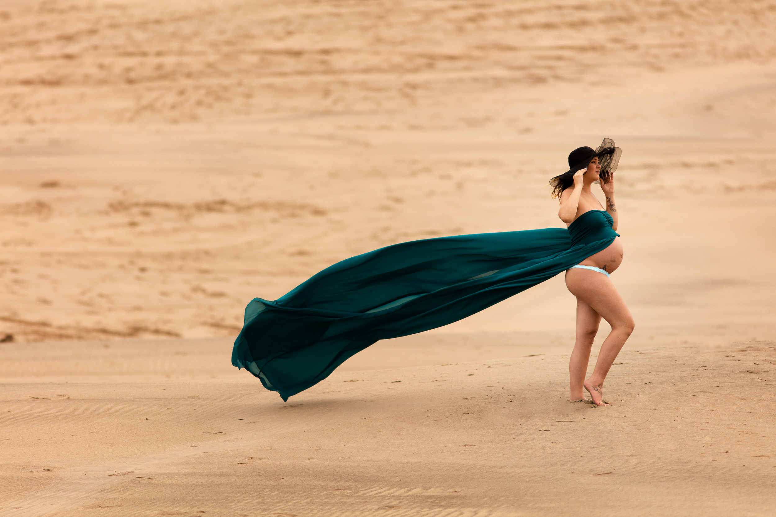 Udendørs gravid fotograf